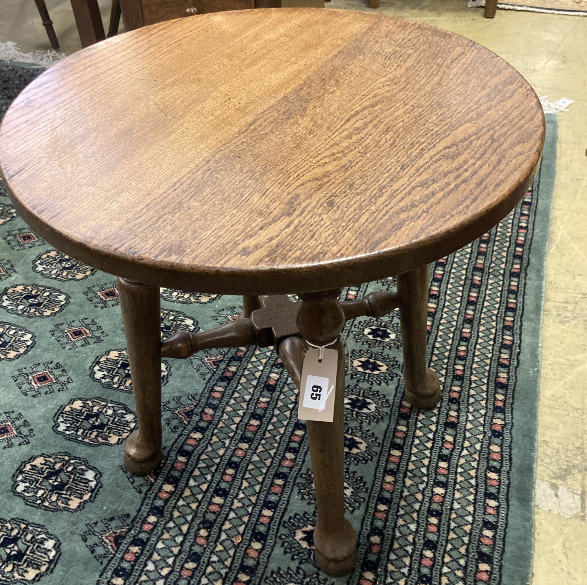 An early 20th century circular oak occasional table, diameter 50cm height 53cm